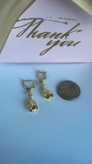 Aretes tres oros