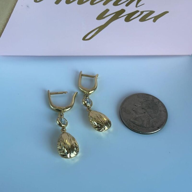 Aretes tres oros