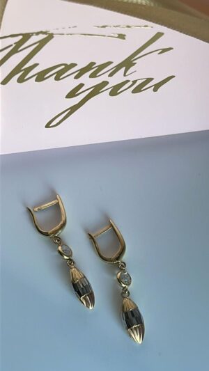 Aretes tres oros