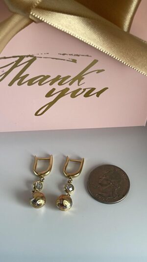 Aretes tres oros