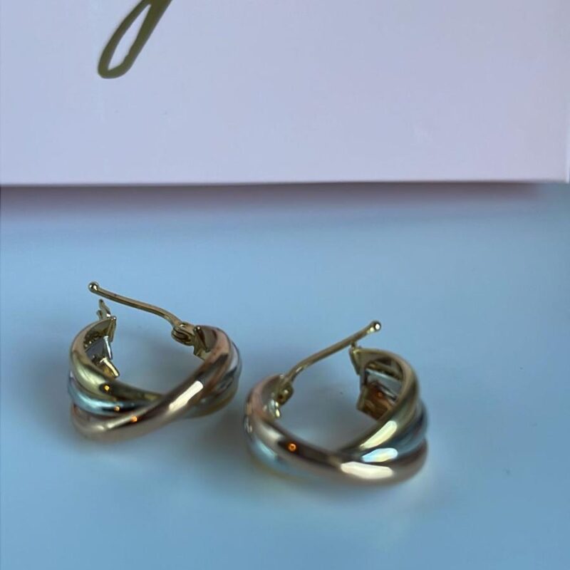 Aretes tres oros