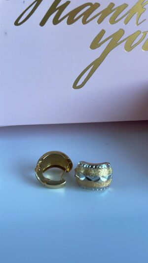 Aretes tres oros