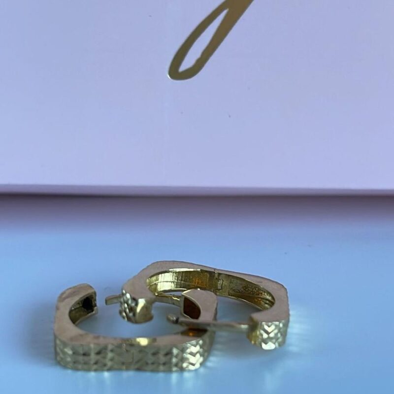 Aretes tres oros