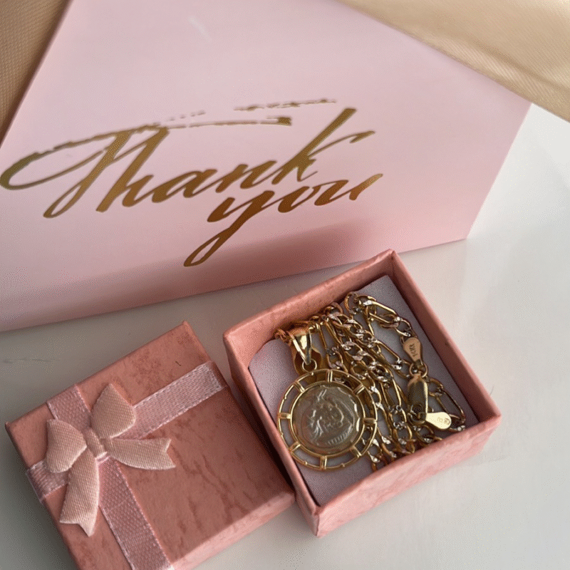 Medalla de bautiso y cadena