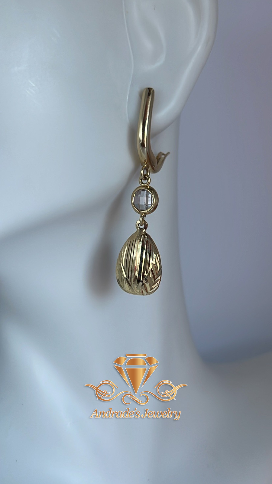 Aretes en oro amarillo con piedra blanca - Imagen 4